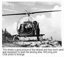 Helicopter on the helipad made of sandbags